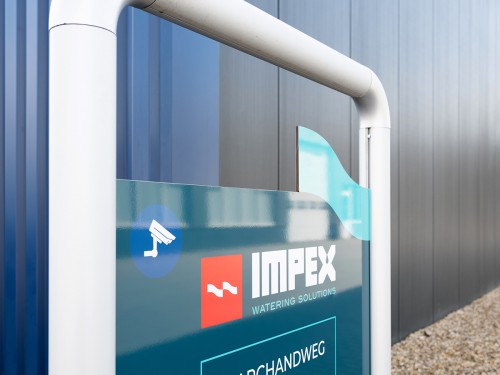 Iwaarden project Impex Barneveld, signing, bewegwijzering, gevelstyling en autobelttering. signing, wayfinding, exterior signage and vehicle graphics 