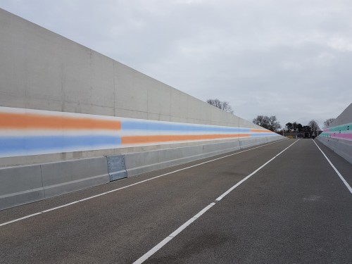 Kunstwerk Roland Schimmel op wanden onderdoorgang spoorlijn, door Iwaarden uitgevoerd als muurschildering, mural