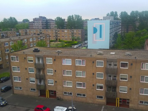 Kunstwerken op flats Haarlem, uitgevoerd door iwaarden, muurschilderingen, artwork, mural