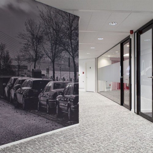 Atmosphere and interior office with wallcovering cut from sandblast foil carried out as a xl print and glass decoration cut from sandblast foil